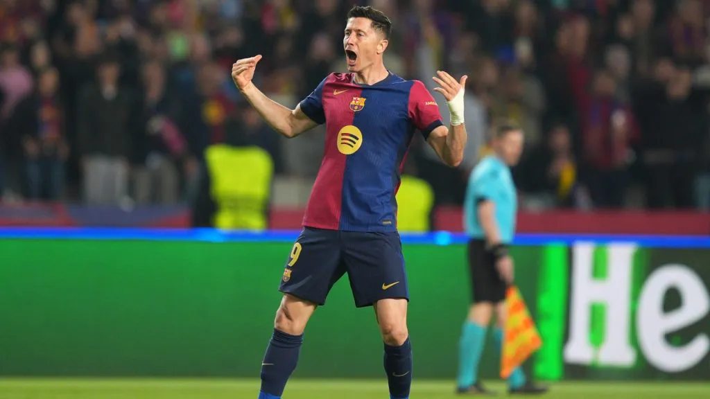 Robert Lewandowski celebrates scoring a goal during the UEFA Champions League 2024/25 match between FC Barcelona and Borussia Dortmund. (Pedro Salado/Getty Images)