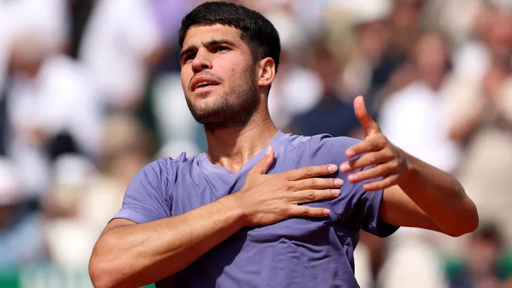 Carlos Alcaraz celebrates winning match point against Arthur Fils in the Monte-Carlo Masters quarterfinals.