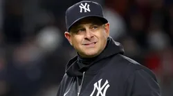 Aaron Boone #17 of the New York Yankees walks back to the dugout.