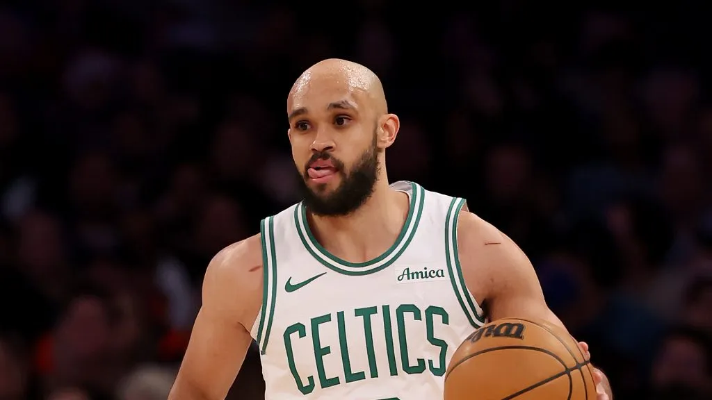 Derrick White #9 of the Boston Celtics takes the ball in the second half against the New York Knicks