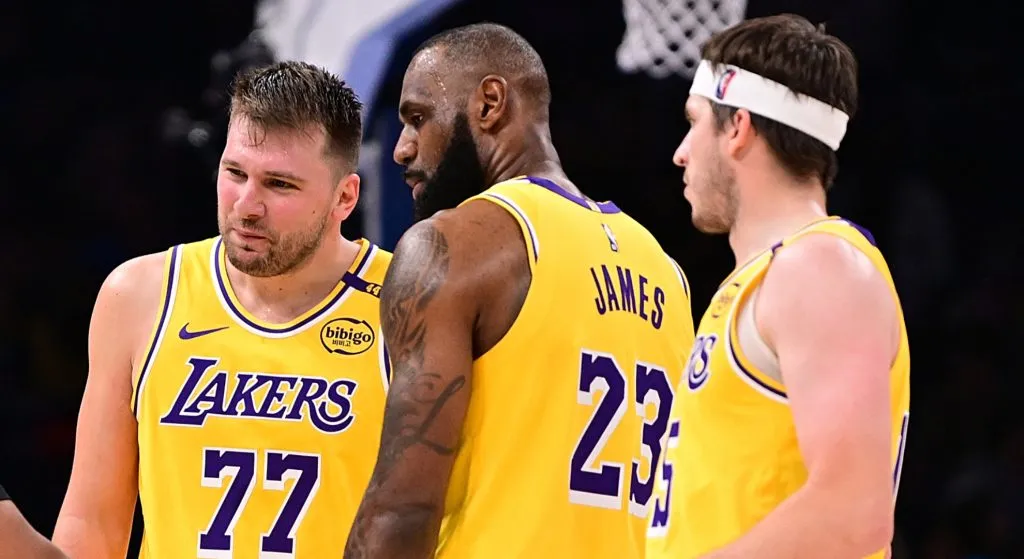 Luka Doncic, Austin Reaves and LeBron James playing for Lakers