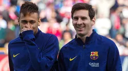 Neymar and Lionel Messi playing with Barcelona during the 2014-15 season.