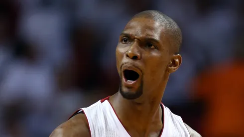 Chris Bosh #1 of the Miami Heat reacts after making a basket in the first quarter while taking on the San Antonio Spurs