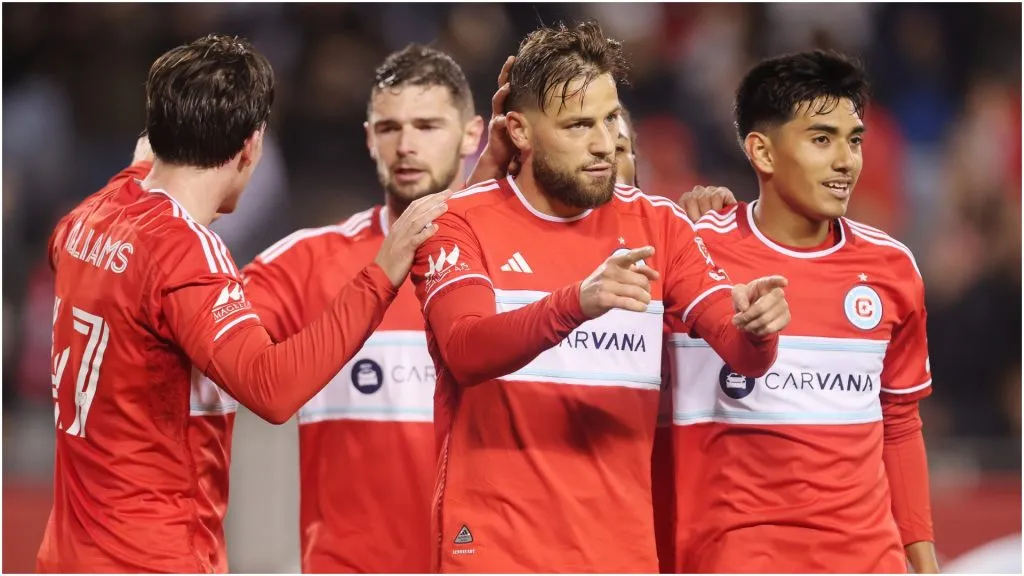 Philip Zinckernagel of Chicago Fire celebrates with teammates ā Michael Reaves/Getty Images