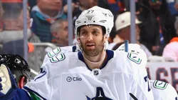 Derek Forbort #27 of the Vancouver Canucks celebrates his second period goal against the New York Islanders at UBS Arena on March 26, 2025 in Elmont, New York.