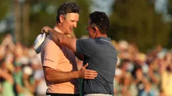 (R-L) Rory McIlroy of Northern Ireland shakes hands with Justin Rose of England after the playoff hole during the final round of the 2025 Masters Tournament at Augusta National Golf Club on April 13, 2025 in Augusta, Georgia.