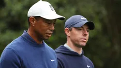 Tiger Woods of the United States and Rory McIlroy of Northern Ireland walk to the 11th fairway during a practice round prior to the 2023 Masters Tournament at Augusta National Golf Club on April 03, 2023 in Augusta, Georgia.