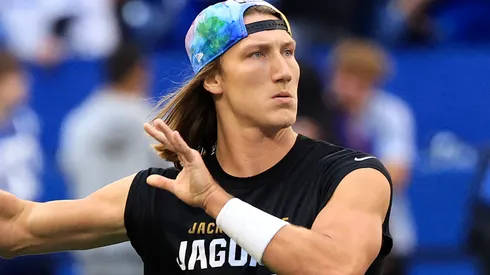 Trevor Lawrence #16 of the Jacksonville Jaguars warms up against the Indianapolis Colts at Lucas Oil Stadium on October 16, 2022 in Indianapolis, Indiana.