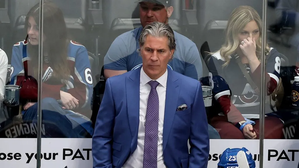 Head coach Jared Bednar of the Colorado Avalanche watches as his team plays the Vancouver Canucks in the second period at Ball Arena on April 10, 2025 in Denver, Colorado.