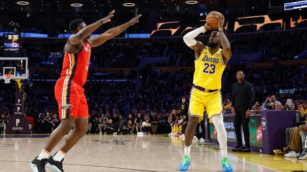 LeBron James shoots a 3-point basket to score his 50,002 NBA regular season and playoff career points during the first half against Zion Williamson in 2025. (Source: Ronald Martinez/Getty Images)