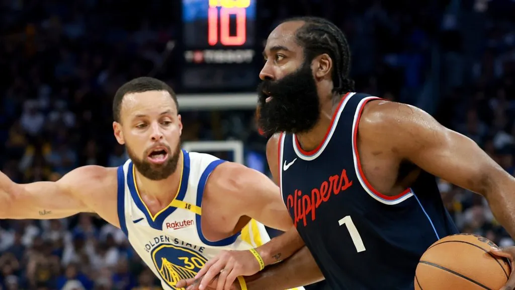 James Harden #1 of the LA Clippers is guarded by Stephen Curry #30 of the Golden State Warriors