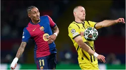 Waldemar Anton of Borussia Dortmund controls the ball whilst under pressure from Raphinha of FC Barcelona