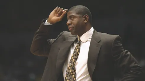 Los Angeles Lakers head coach Earvin (Magic) Johnson looks on during a game against the Atlanta Hawks at the Great Western Forum in Inglewood, California.