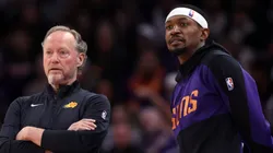 Head coach Mike Budenholzer of the Phoenix Suns and Bradley Beal #3 watch the action during the first half against the Philadelphia 76ers at Footprint Center on November 04, 2024 in Phoenix, Arizona.