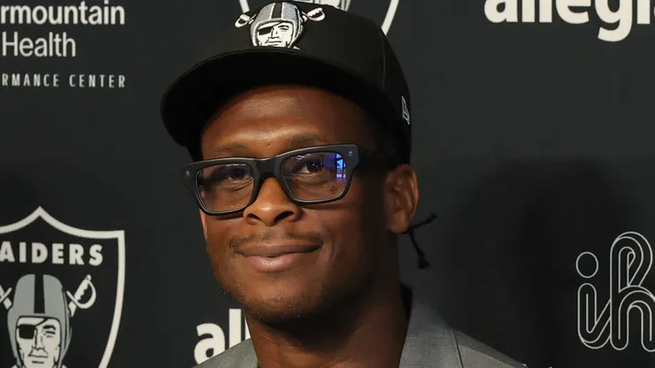 Quarterback Geno Smith (L) and head coach Pete Carroll of the Las Vegas Raiders attend a news conference introducing Smith on April 07, 2025.