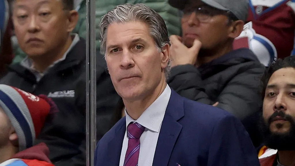 Head coach Jared Bednar of the Colorado Avalanche watches as his team plays the New York Islanders in the third period at Ball Arena on January 02, 2024. (Source: Matthew Stockman/Getty Images)