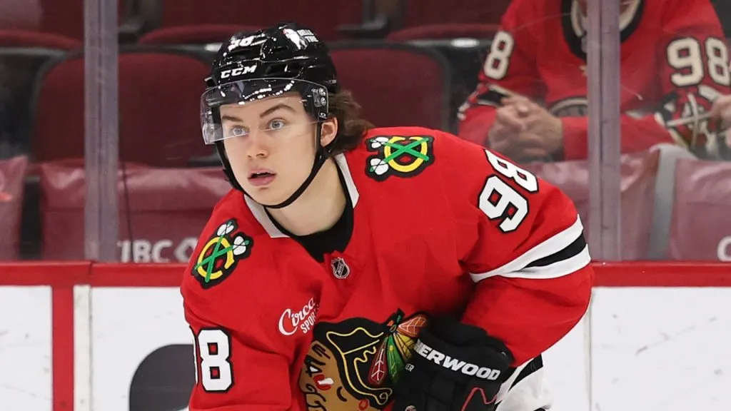 Connor Bedard #98 of the Chicago Blackhawks controls the puck during the second period against the Winnipeg Jets at the United Center on April 12, 2025 in Chicago, Illinois.