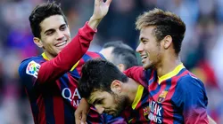 Cesc Fabregas (C) of FC Barcelona celebrates with his teammates Marc Bartra (L) and Neymar after scoring his team's second goal from the penalty spot during the La Liga match between FC Barcelona and Granda CF at Camp Nou on November 23, 2013 in Barcelona, Spain.
