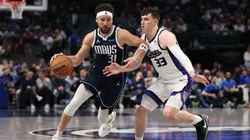 Klay Thompson #31 of the Dallas Mavericks brings the ball up court against Jake LaRavia #33 of the Sacramento Kings during the second half at American Airlines Center on March 03, 2025 in Dallas, Texas.