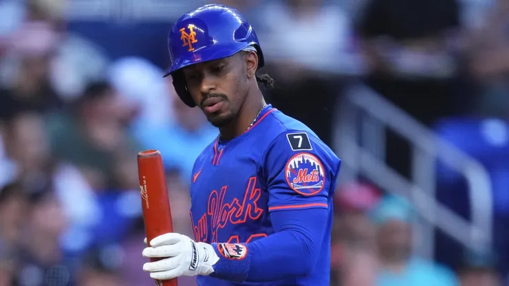 Francisco Lindor #12 of the New York Mets looks at his torpedo bat during the third inning against the Miami Marlins at loanDepot park on April 01, 2025 in Miami, Florida.