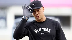 Aaron Judge #99 of the New York Yankees adjusts his hat during batting practice before the game against the Kansas City Royals at Yankee Stadium on April 15, 2025 in the Bronx borough of New York City.