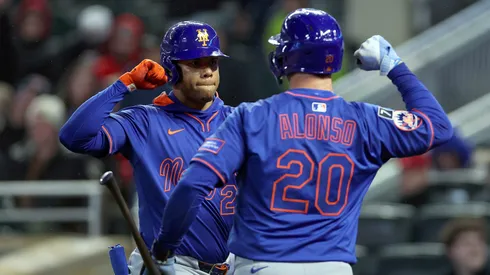 Juan Soto #22 of the New York Mets celebrates his two-run home run against the Minnesota Twins with teammate Pete Alonso #20 in the seventh inning at Target Field on April 14, 2025 in Minneapolis, Minnesota. The Mets defeated the Twins 5-1.