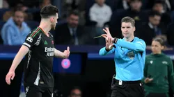 Referee Francois Letexier gestures to overturn the yellow card for Declan Rice of Arsenal and penalty earlier awarded to Real Madrid following a VAR check