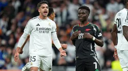 Raul Asencio of Real Madrid celebrates after teammate Thibaut Courtois (not pictured) saves the penalty kick from Bukayo Saka of Arsenal.