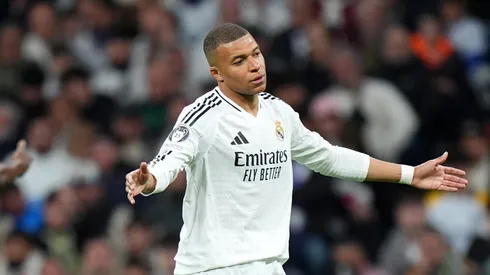 Kylian Mbappe of Real Madrid reacts during the UEFA Champions League 2024/25 Quarter Final Second Leg match between Real Madrid C.F. and Arsenal FC at Estadio Santiago Bernabeu on April 16, 2025 in Madrid, Spain.