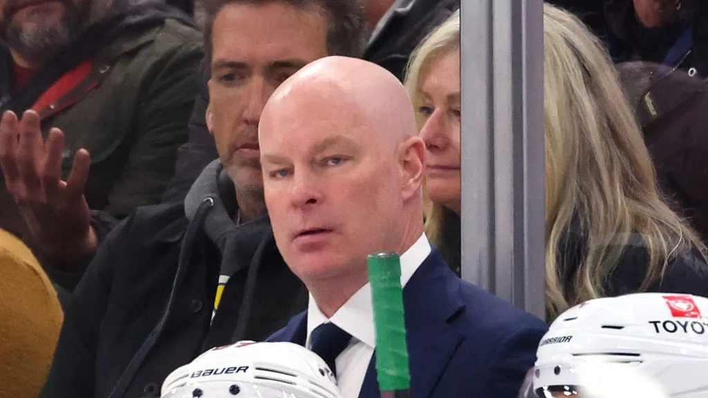 Head coach John Hynes of the Minnesota Wild looks on against the Chicago Blackhawks during the second period at the United Center on February 07, 2024 in Chicago, Illinois.