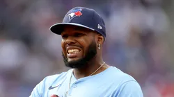 Vladimir Guerrero Jr. #27 of the Toronto Blue Jays interacts with the New York Mets dugout during the home opener at Citi Field on April 04, 2025 in the Flushing neighborhood of the Queens borough of New York City. (Photo by Elsa/Getty Images)