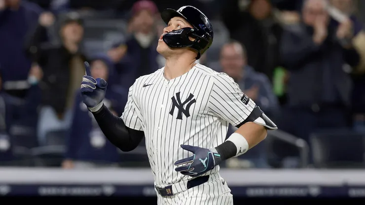 Aaron Judge #99 of the New York Yankees gestures as he runs the bases on his seventh inning home run against the Kansas City Royals at Yankee Stadium on April 16, 2025 in New York City.