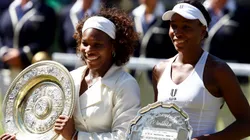 Serena and Venus Williams during the trophy ceremony in 2009 Wimbledon