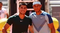 Carlos Alcaraz and Rafael Nadal pose for a photo ahead of a Madrid Open game.