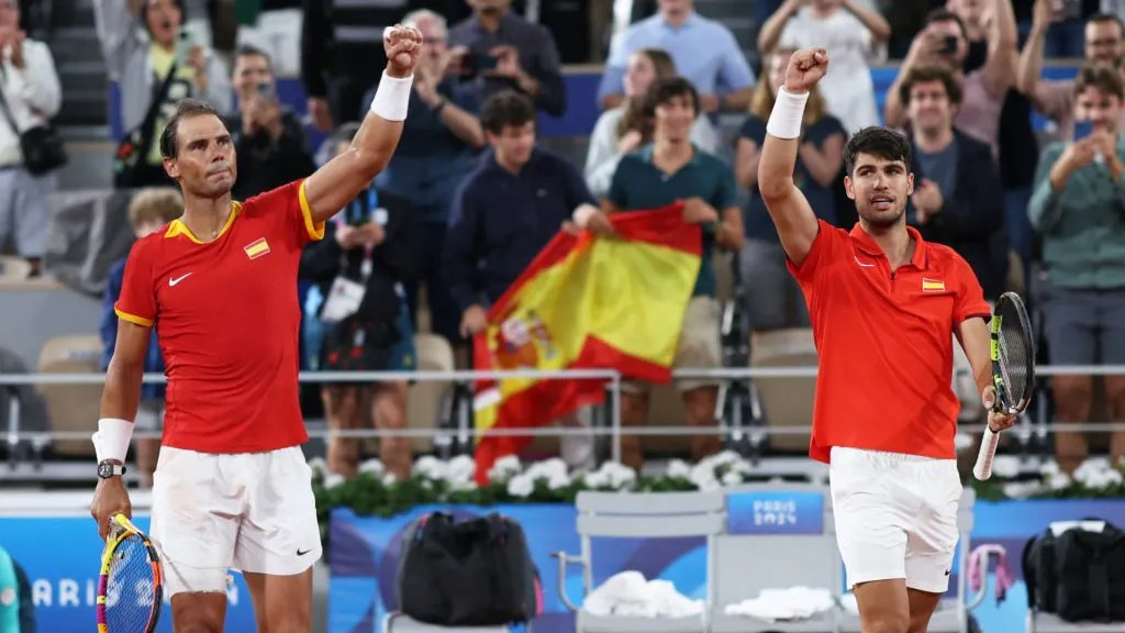 Rafael Nadal (L) and partner Carlos Alcaraz of Team Spain celebrate victory against Andres Molteni and Maximo Gonzalez during the 2024 Olympics. (Clive Brunskill/Getty Images)