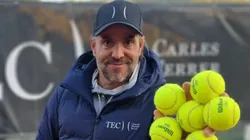 Roberto Carretero poses in a tennis court.