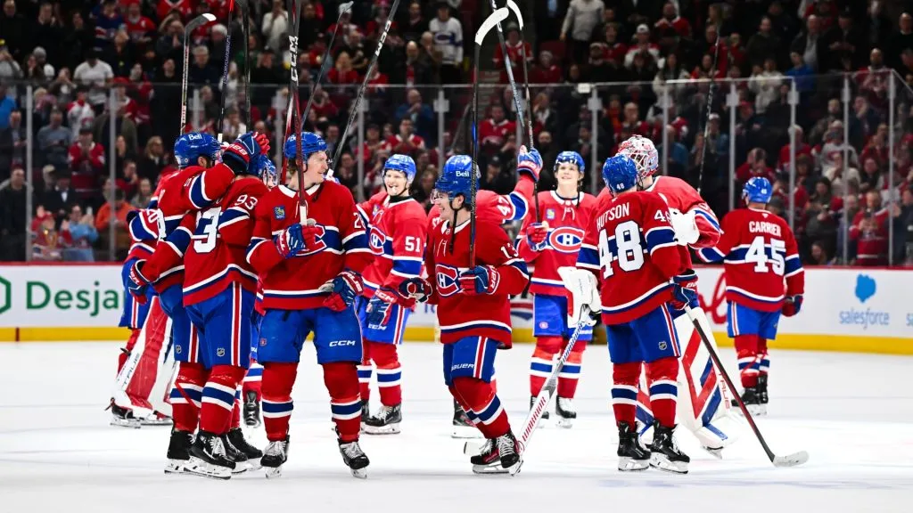 The Montreal Canadiens celebrate a 4-2 victory against the Carolina Hurricanes and clinch the last spot in the Eastern Conference playoffs at the Bell Centre on April 16, 2025. (Source: Minas Panagiotakis/Getty Images)
