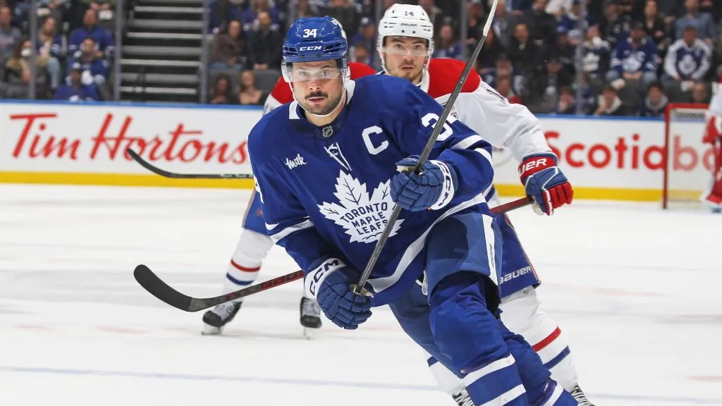 Auston Matthews #34 of the Toronto Maple Leafs skates against nick Suzuki #14 of the Montreal Canadiens during the third period of an NHL game at Scotiabank Arena on April 12, 2025 in Toronto. (Photo by Claus Andersen/Getty Images)