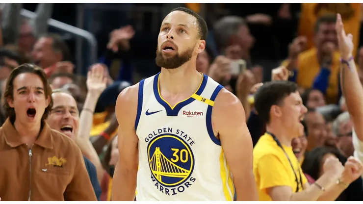 Stephen Curry #30 of the Golden State Warriors reacts after making a basket against the Memphis Grizzlies in the second half of the NBA play-in tournament game at Chase Center on April 15, 2025 in San Francisco, California.