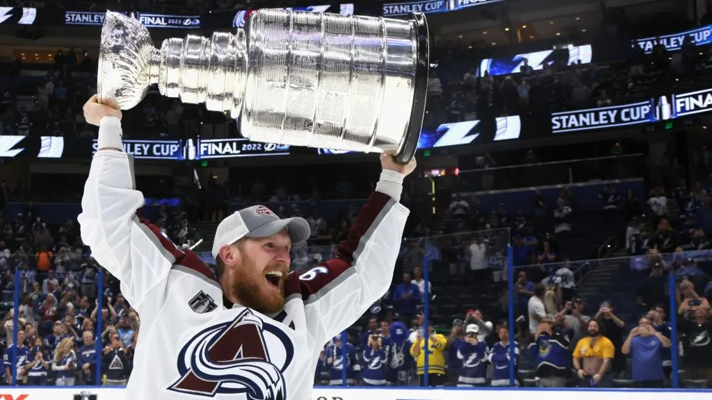 Gabriel Landeskog #92 of the Colorado Avalanche carries the Stanley Cup following the series winning victory over the Tampa Bay Lightning in Game Six of the 2022 NHL Stanley Cup Final. (Photo by Bruce Bennett/Getty Images)