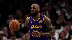 LeBron James #23 of the Los Angeles Lakers dribbles the ball against the Dallas Mavericks