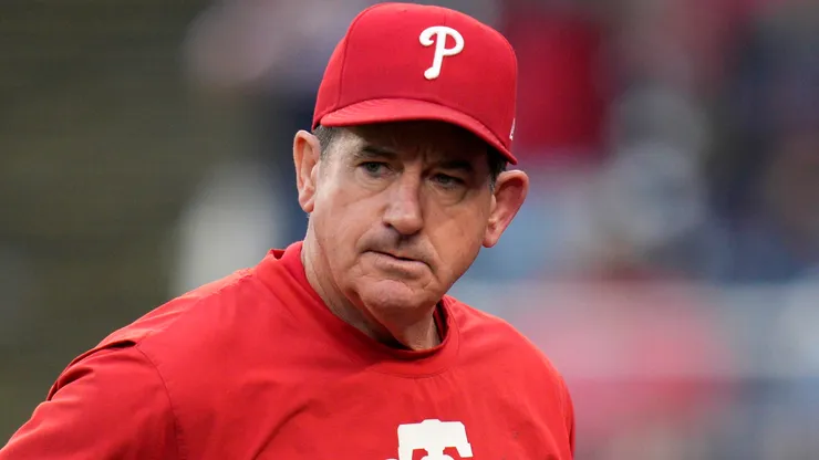 Rob Thomson #59 of the Philadelphia Phillies walks to the dugout during the seventh inning against the Washington Nationals at Nationals Park on September 29, 2024 in Washington, DC.