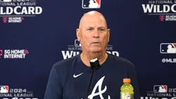 Manager Brian Snitker #43 of the Atlanta Braves speaks to the media during a press conference.