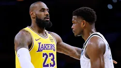 LeBron James #23 of the Los Angeles Lakers directs a play as he is guarded by Anthony Edwards #5 of the Minnesota Timberwolves during the first half at Crypto.com Arena on February 27, 2025 in Los Angeles, California.