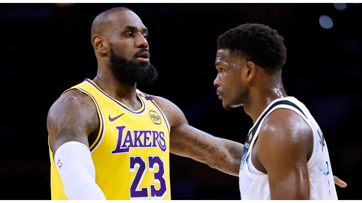 LeBron James #23 of the Los Angeles Lakers directs a play as he is guarded by Anthony Edwards #5 of the Minnesota Timberwolves during the first half at Crypto.com Arena on February 27, 2025 in Los Angeles, California.