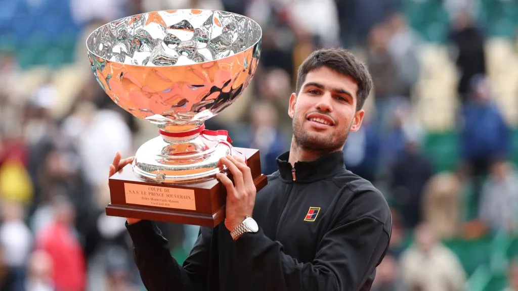 Carlos Alcaraz of Spain holds the Monte Carlo trophy after winning the final of the singles against Lorenzo Musetti of Italy. (Clive Brunskill/Getty Images)