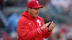 Rob Thomson #59 of the Philadelphia Phillies claps.