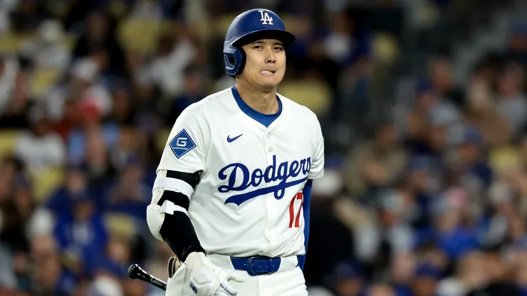 Shohei Ohtani #17 of the Los Angeles Dodgers reacts after a strike out to end the fifth inning against the Colorado Rockies at Dodger Stadium on April 16, 2025 in Los Angeles, California.