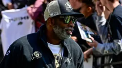 Head coach Deion Sanders of Colorado Buffaloes runs onto the field before the Black and Gold Spring Game at Folsom Field on April 19, 2025 in Boulder, Colorado.