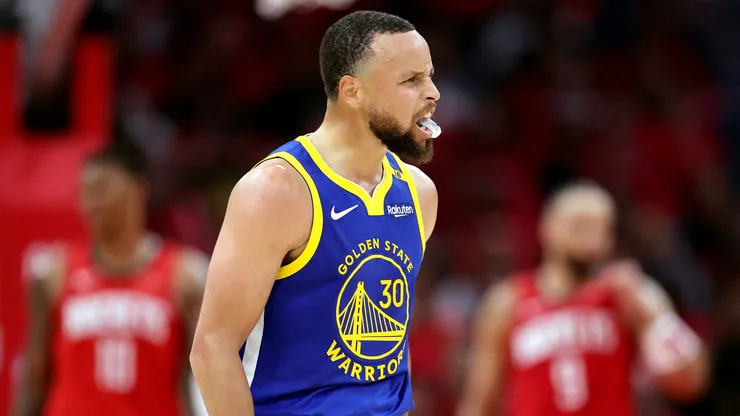 Stephen Curry #30 of the Golden State Warriors celebrates a basket against the Houston Rockets during the second quarter in Game One of the Western Conference First Round NBA Playoffs at Toyota Center on April 20, 2025 in Houston, Texas.